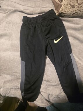 Nike Black Joggers with Gray Panels and Yellow Swoosh